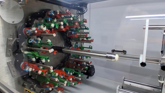 close up view of MMBT32CHFWB 32 carrier fine wire braider red and green standard carriers 1-16 triaxial available with kit