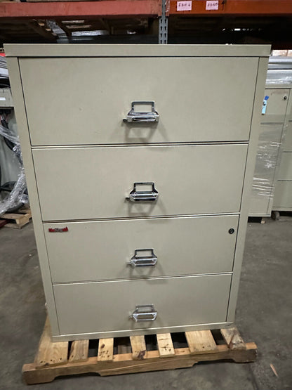 FIRE KING 4 DRAWER LATERAL FIREPROOF CABINET. HAS LOCK AND KEY. 37.5" x 52 3/4"