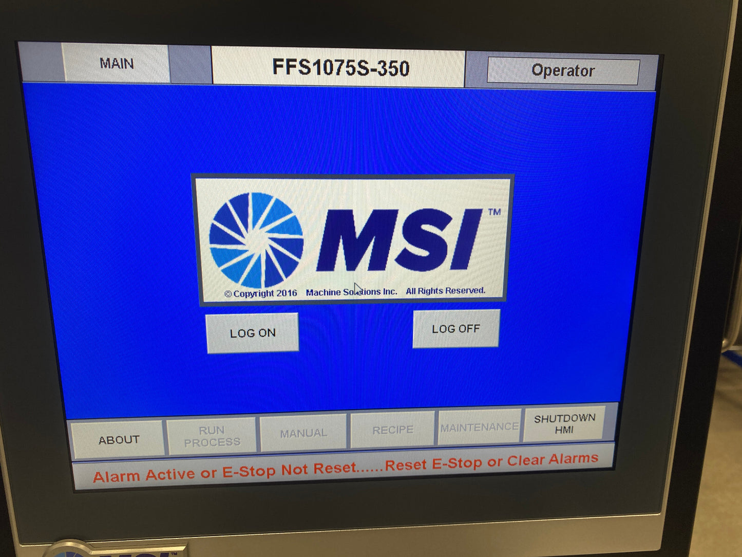 Computer screen displaying the MSI logo with login options on a blue background