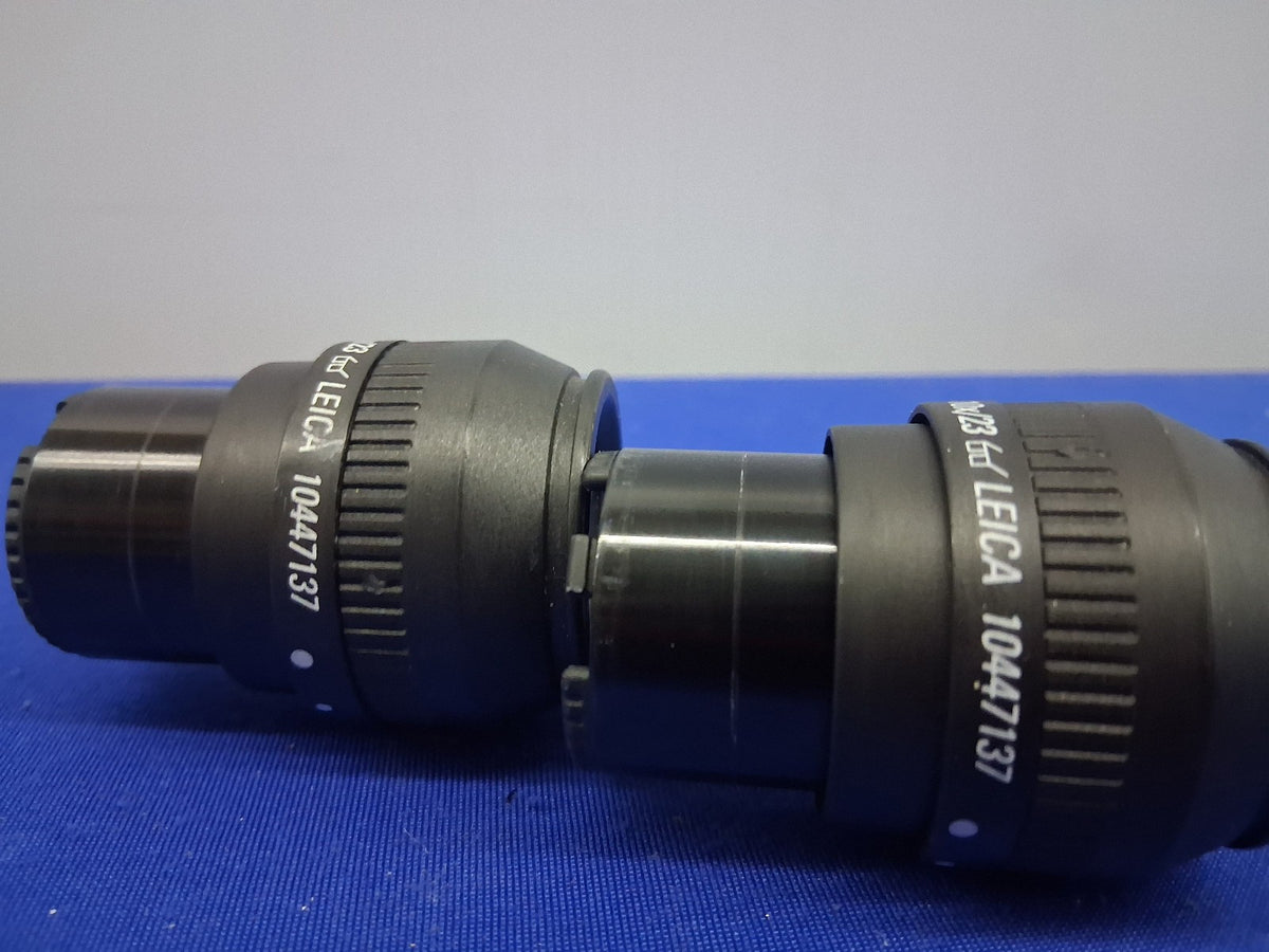 PAIR OF LEICA 10447137 10X/23 EYEPIECES STEREO ZOOM SELLING A 1 LOT OF QTY. 2