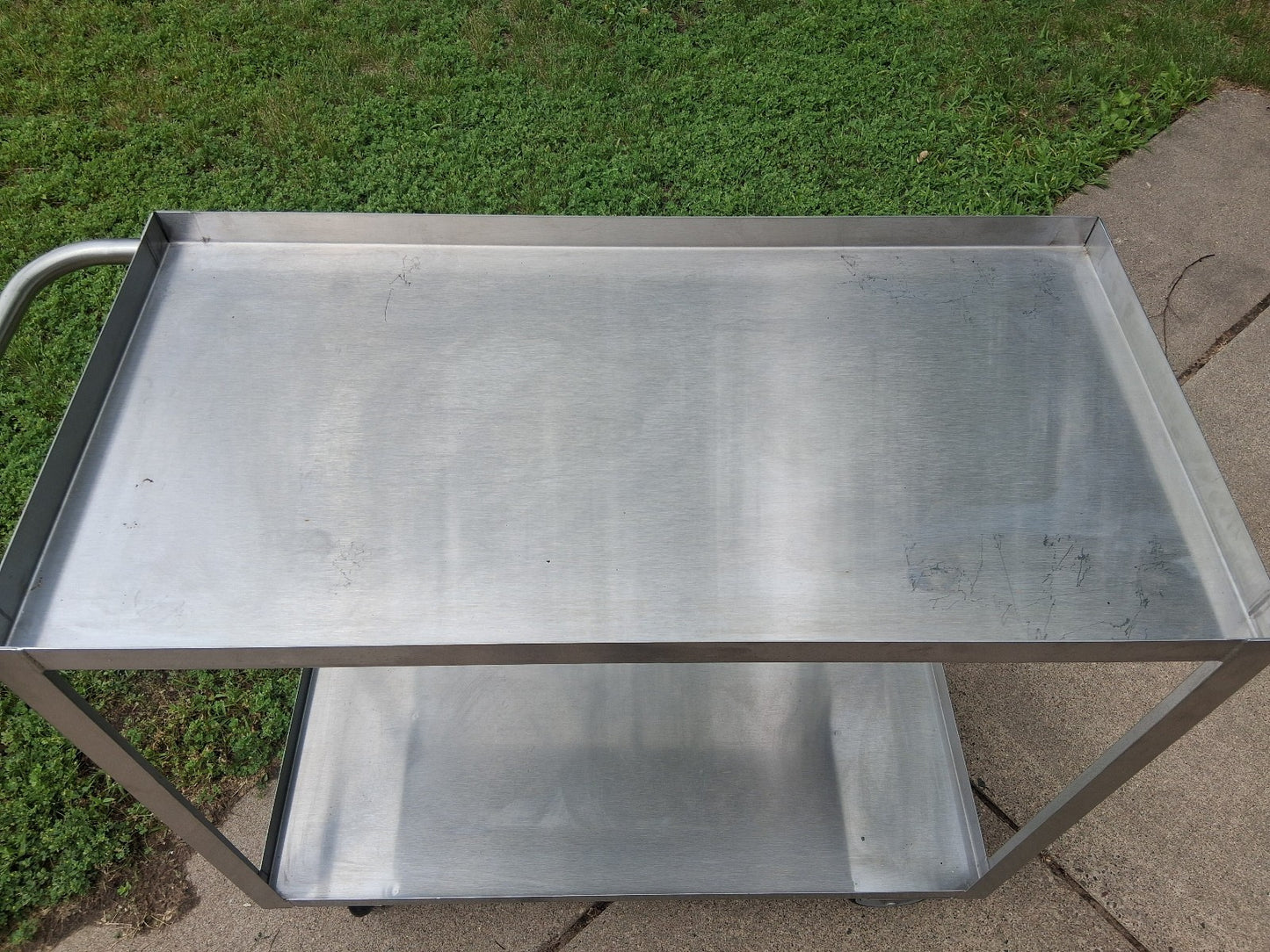 Jamco Stainless Steel Cart 18" x 36"  2 Shelf With Lips Casters Utility Cart