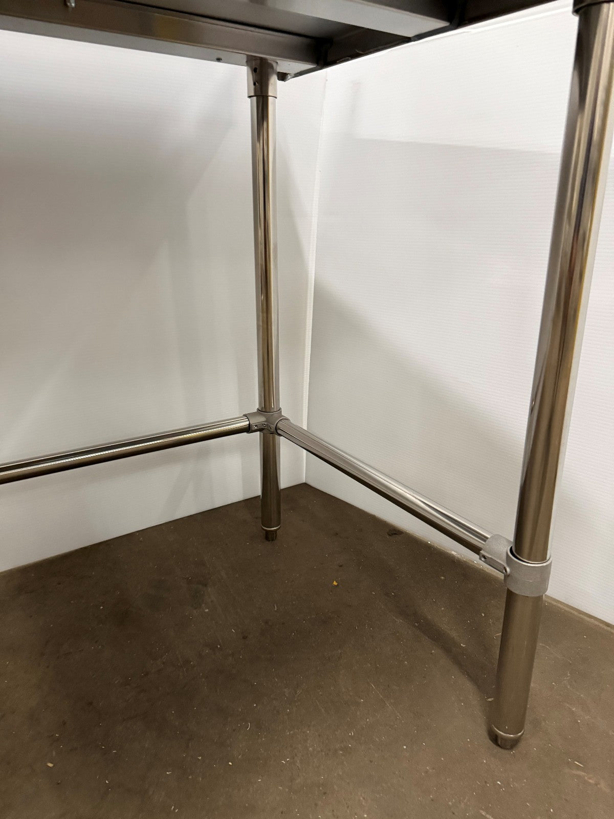 Stainless Steel Table 29" W x 60" L x 35 1/2" H 5" Backsplash