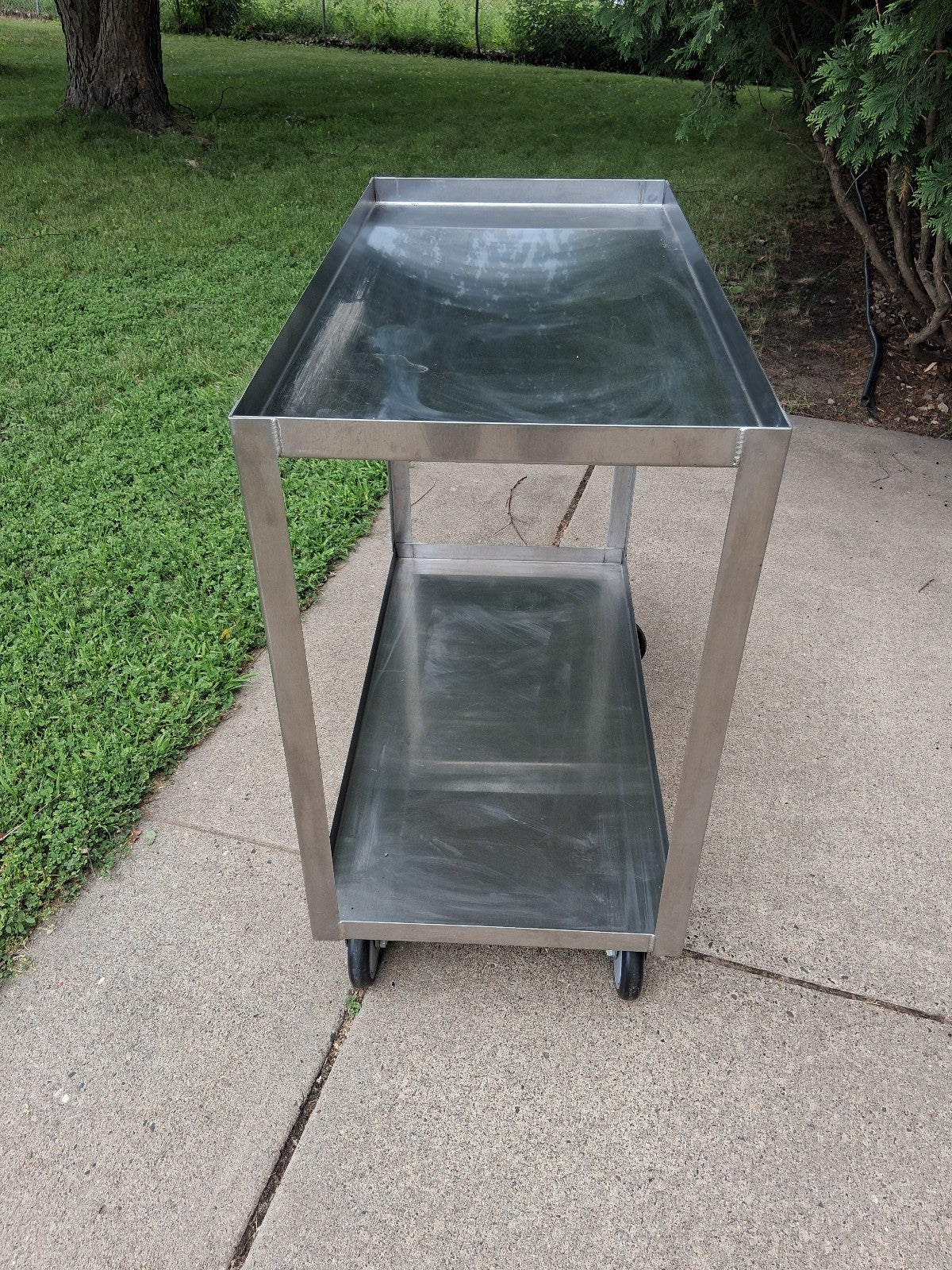Jamco Stainless Steel Cart 18" x 36"  2 Shelf With Lips Casters Utility Cart