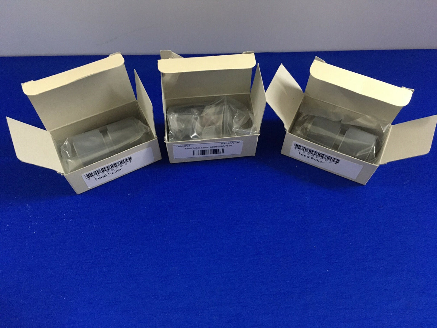 LOT DE 3 ROULEAUX D'ALIMENTATION MA2-6772-000 / C6080P02 AUCUN NOM DE FABRICANT SUR L'ÉTIQUETTE