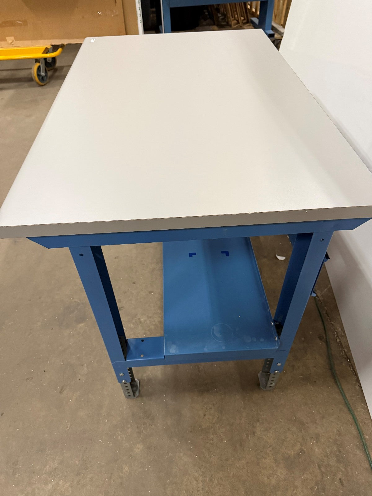 48" W X 30" D X 34" TALL TABLE / WORKBENCH WHITE TABLE TOP WITH BLUE LEGS SHELF